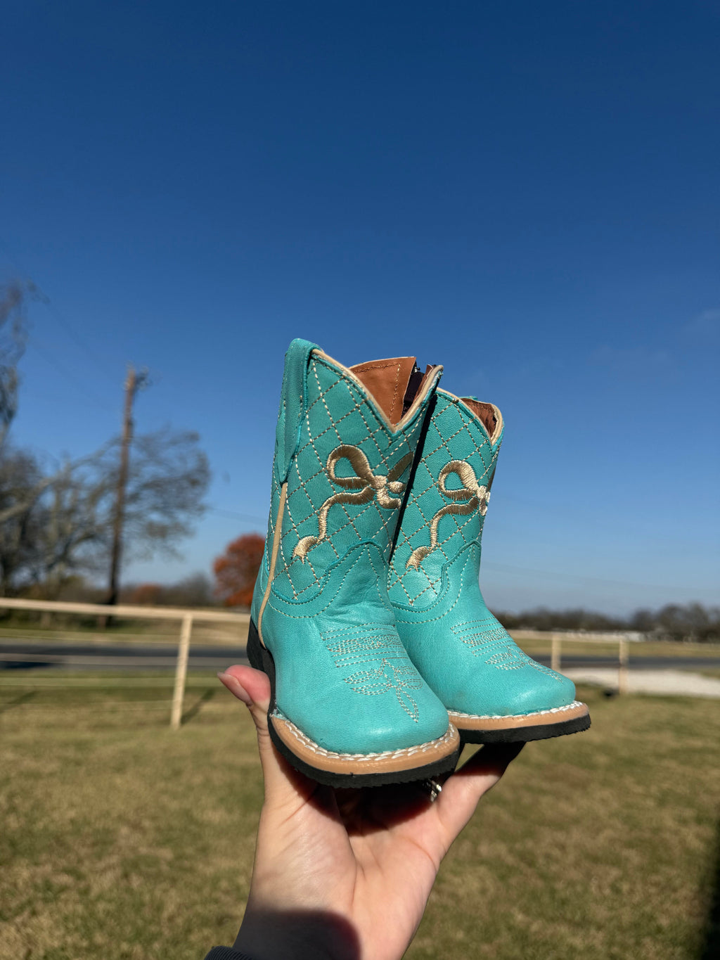 Turquoise Bow Tanner Mark Boots