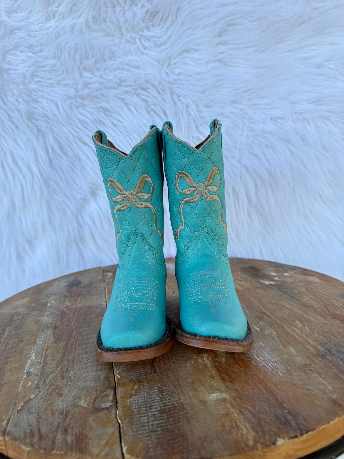 Turquoise Bow Tanner Mark Boots