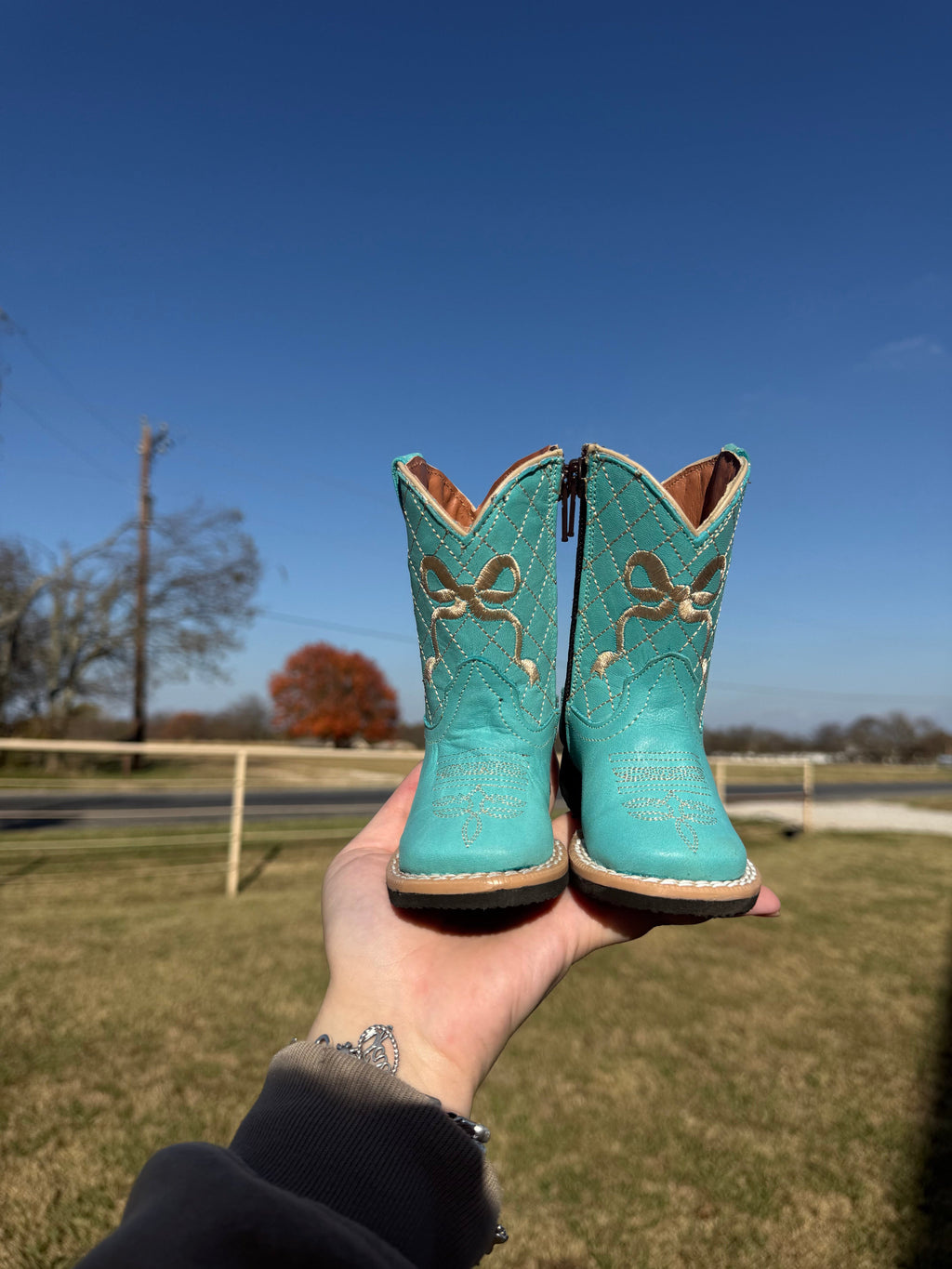 Turquoise Bow Tanner Mark Boots