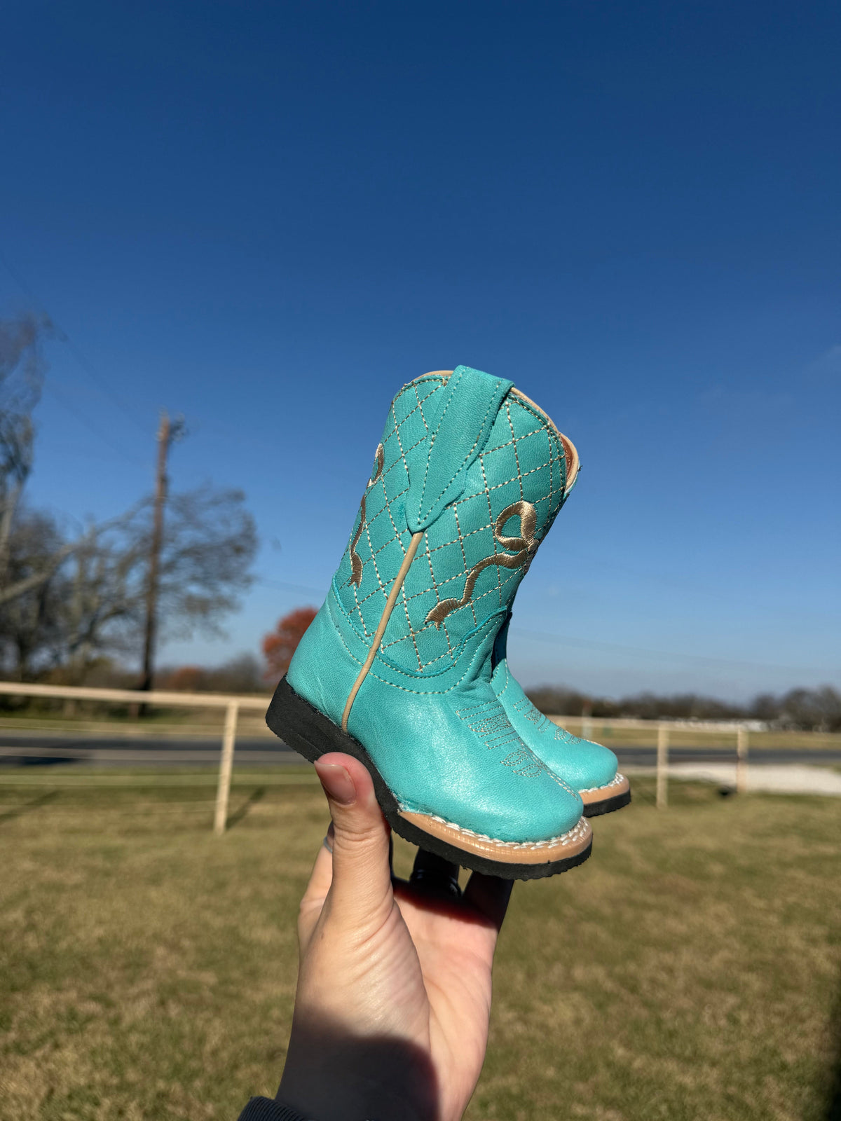 Turquoise Bow Tanner Mark Boots
