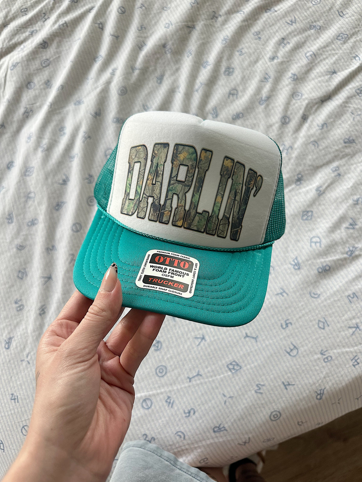 Camo Darlin’ Trucker Hat (Multiple Color Options)