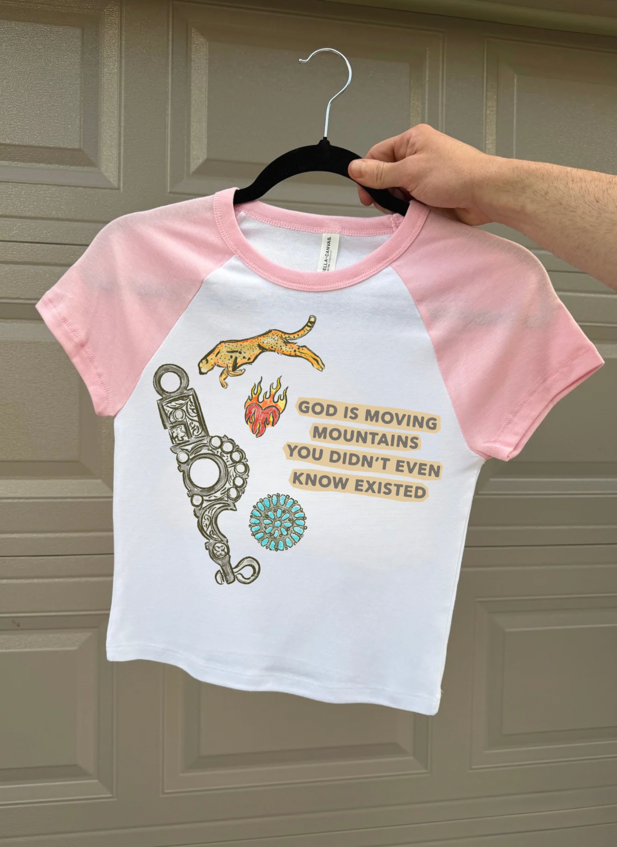 God Is Moving Mountains Baby Tee