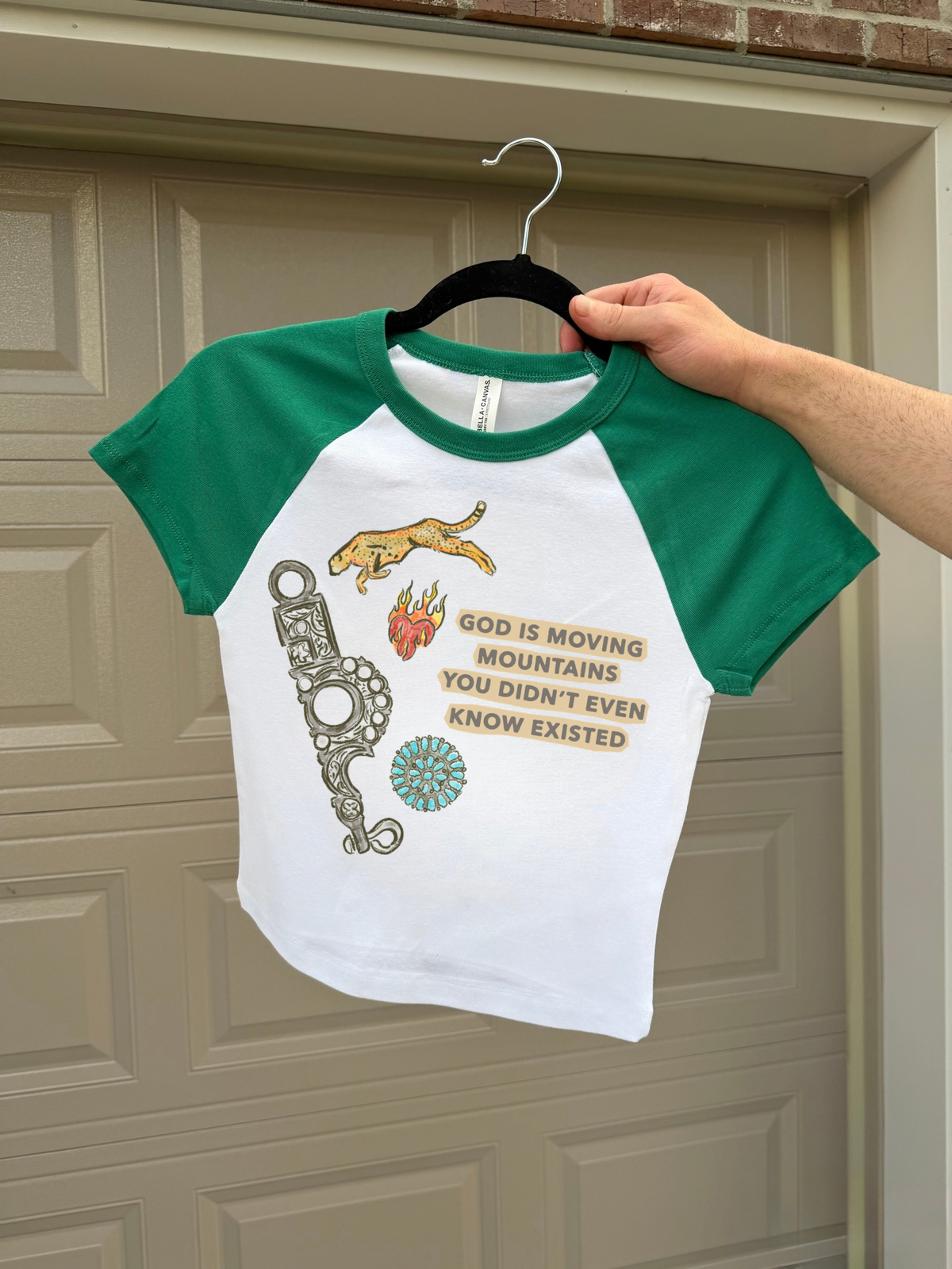 God Is Moving Mountains Baby Tee