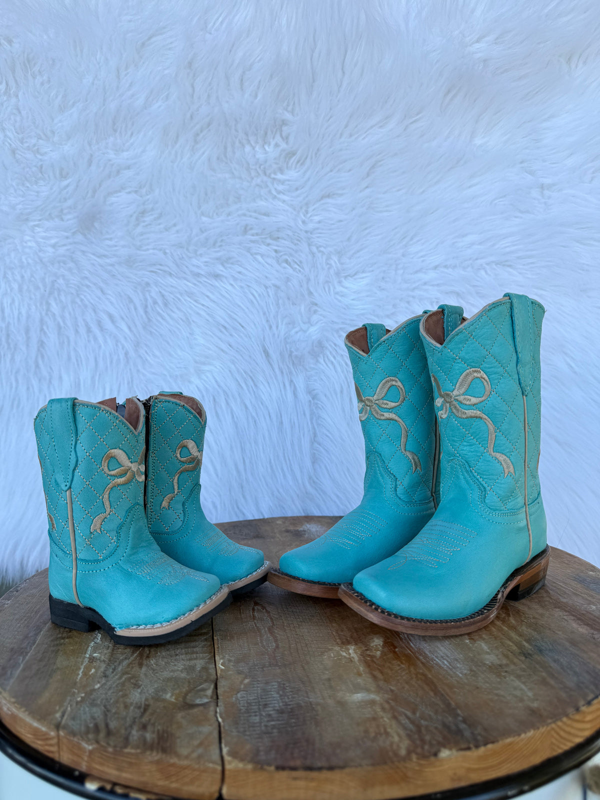 Turquoise Bow Tanner Mark Boots