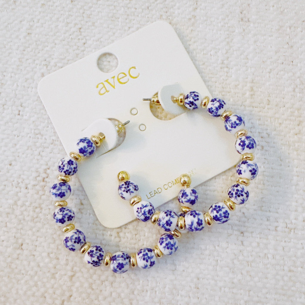 Blue Bloom Floral Hoop Earrings – Elegant Hoops with Soft Blue Flower Accents