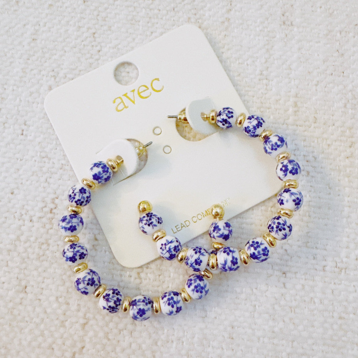 Blue Bloom Floral Hoop Earrings – Elegant Hoops with Soft Blue Flower Accents