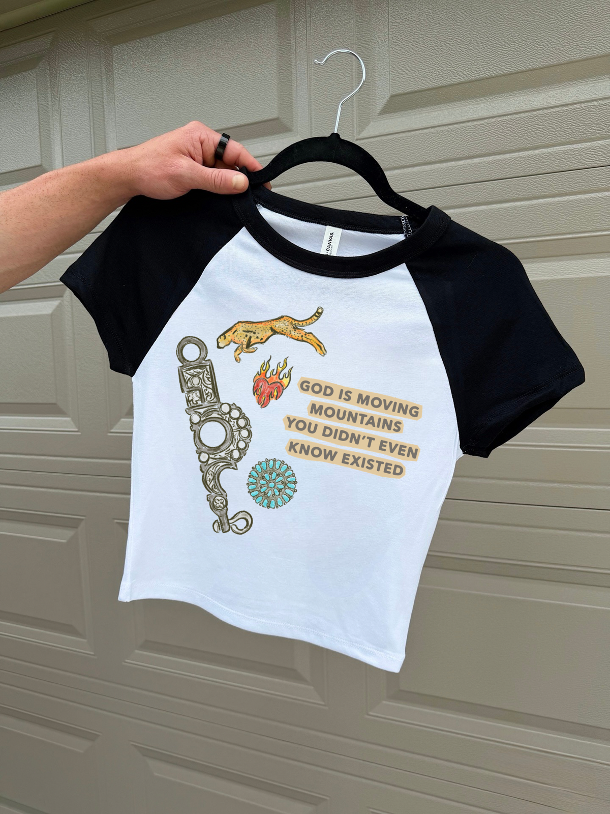 God Is Moving Mountains Baby Tee