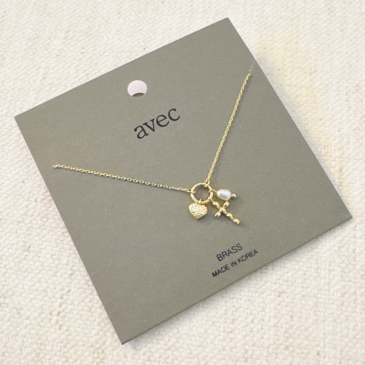 Faith & Love Charm Necklace – Gold-Tone Chain with Heart, Cross, and Pearl Charms
