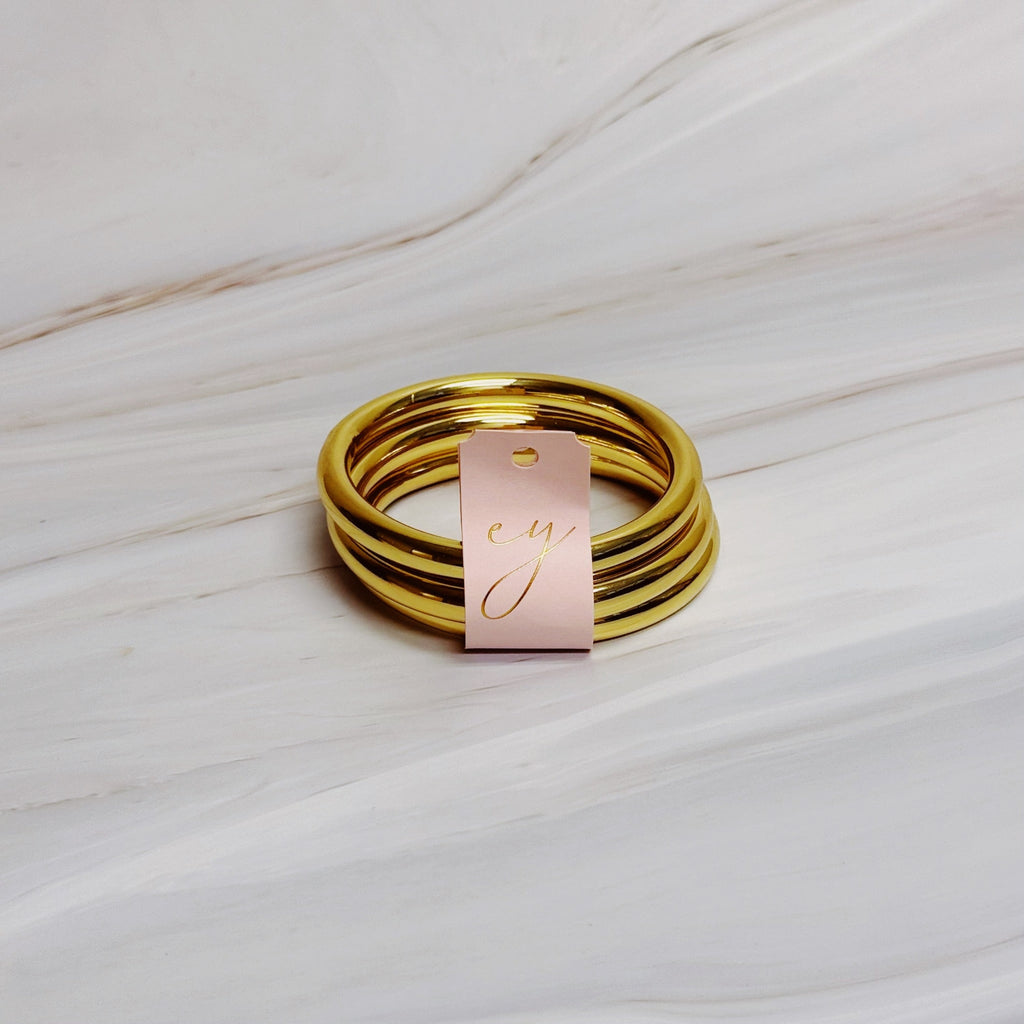 Golden Stack Luxe Bangle Set – Sleek Polished Gold-Tone Arm Candy in Classic Stacking Style