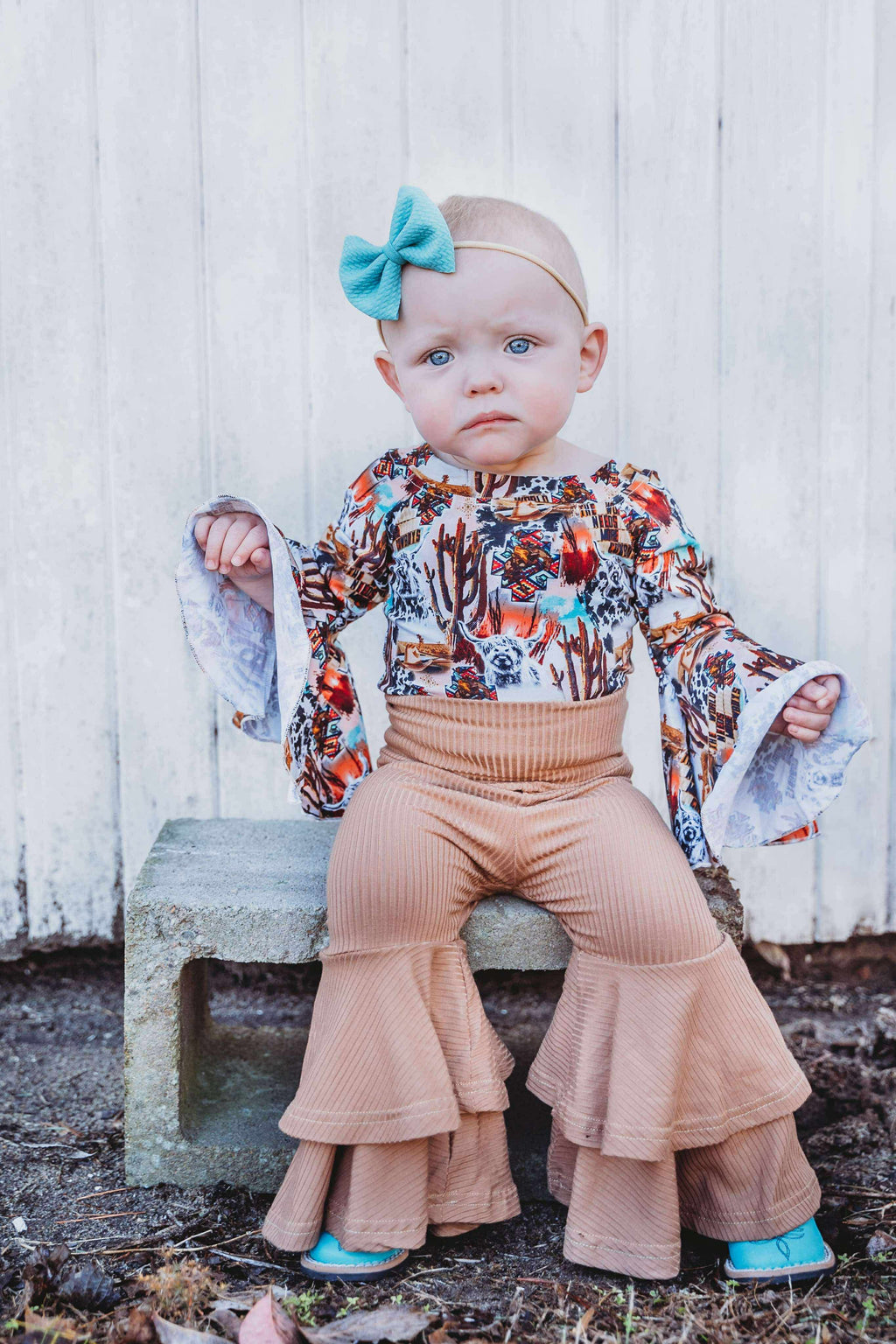 The World Needs More Cowboys Bell Sleeve Leo/Top