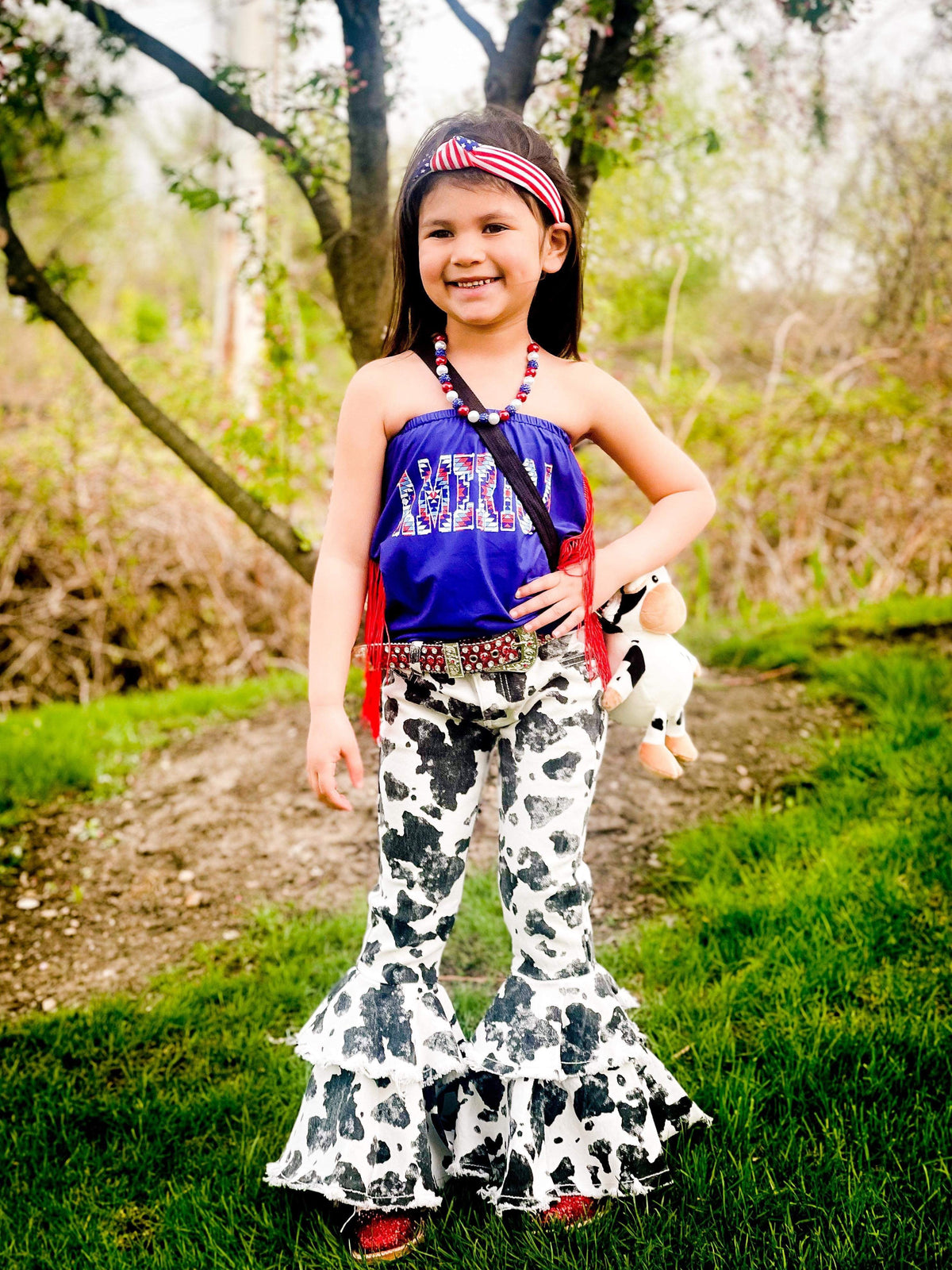 Black Cow Print Rodeo Queen Jeans