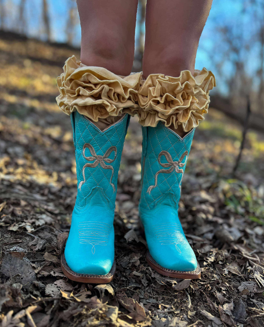 Turquoise Bow Tanner Mark Boots