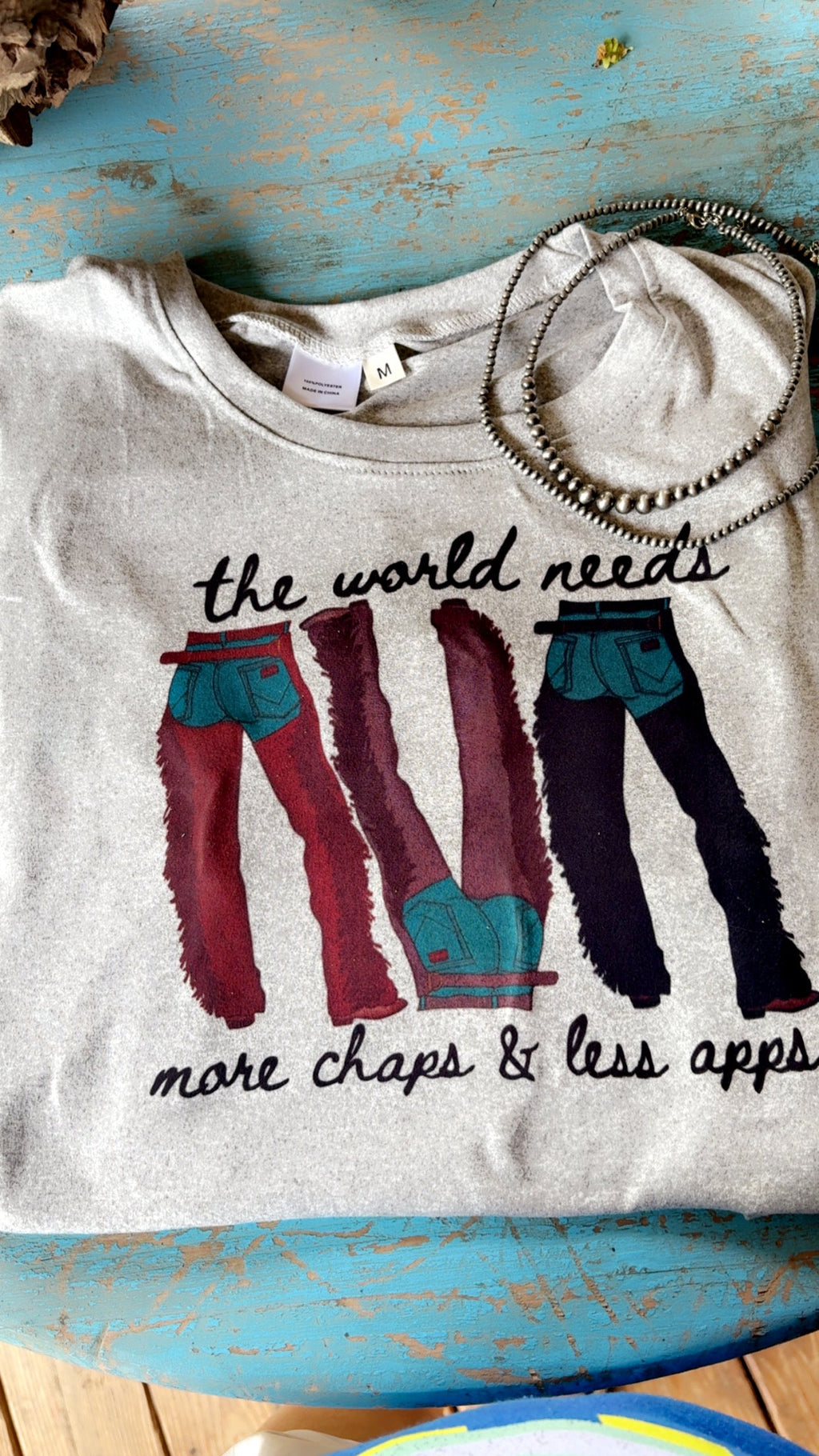 The world needs more chaps  sublimation T-shirt