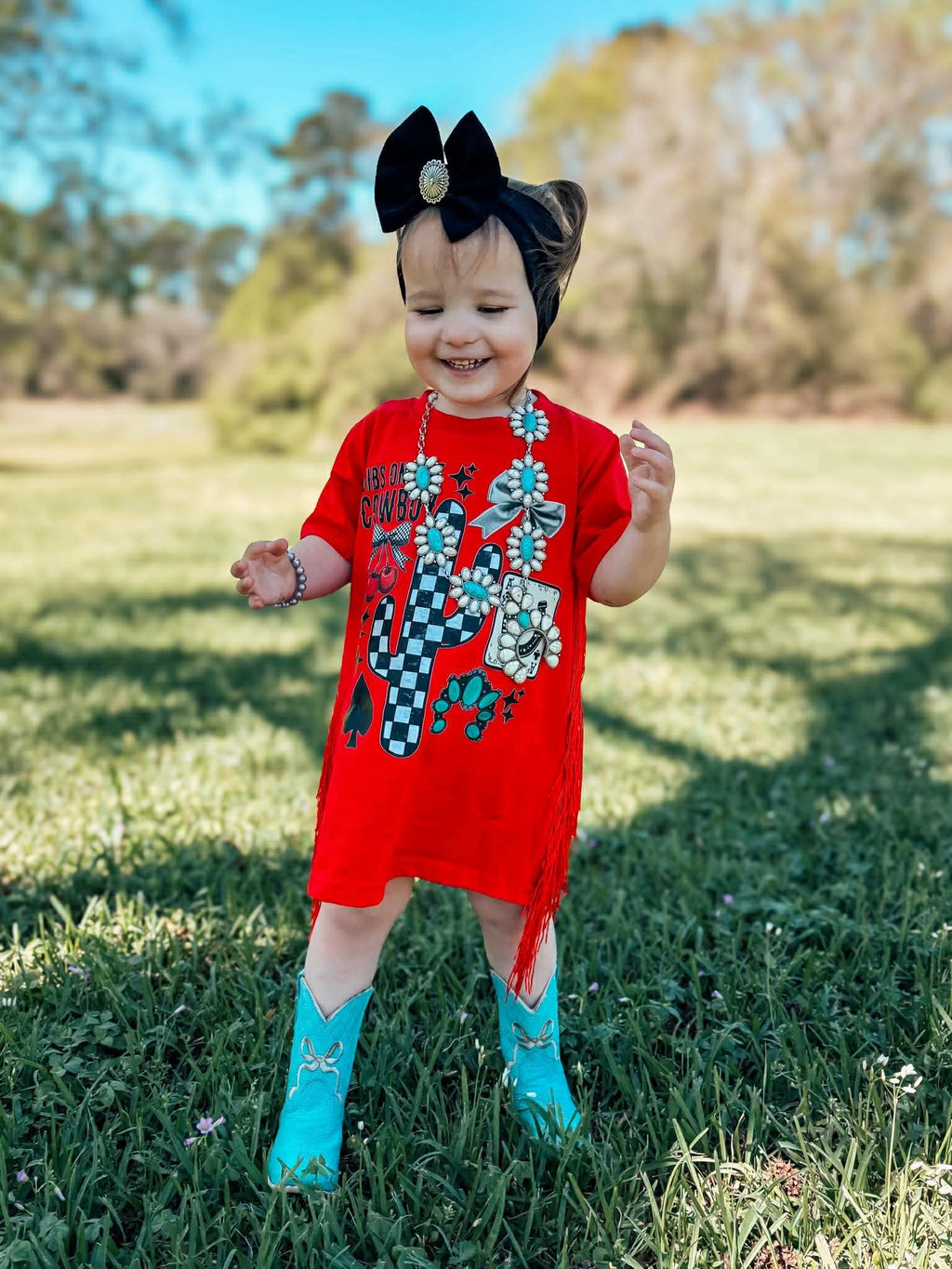 Turquoise Bow Tanner Mark Boots