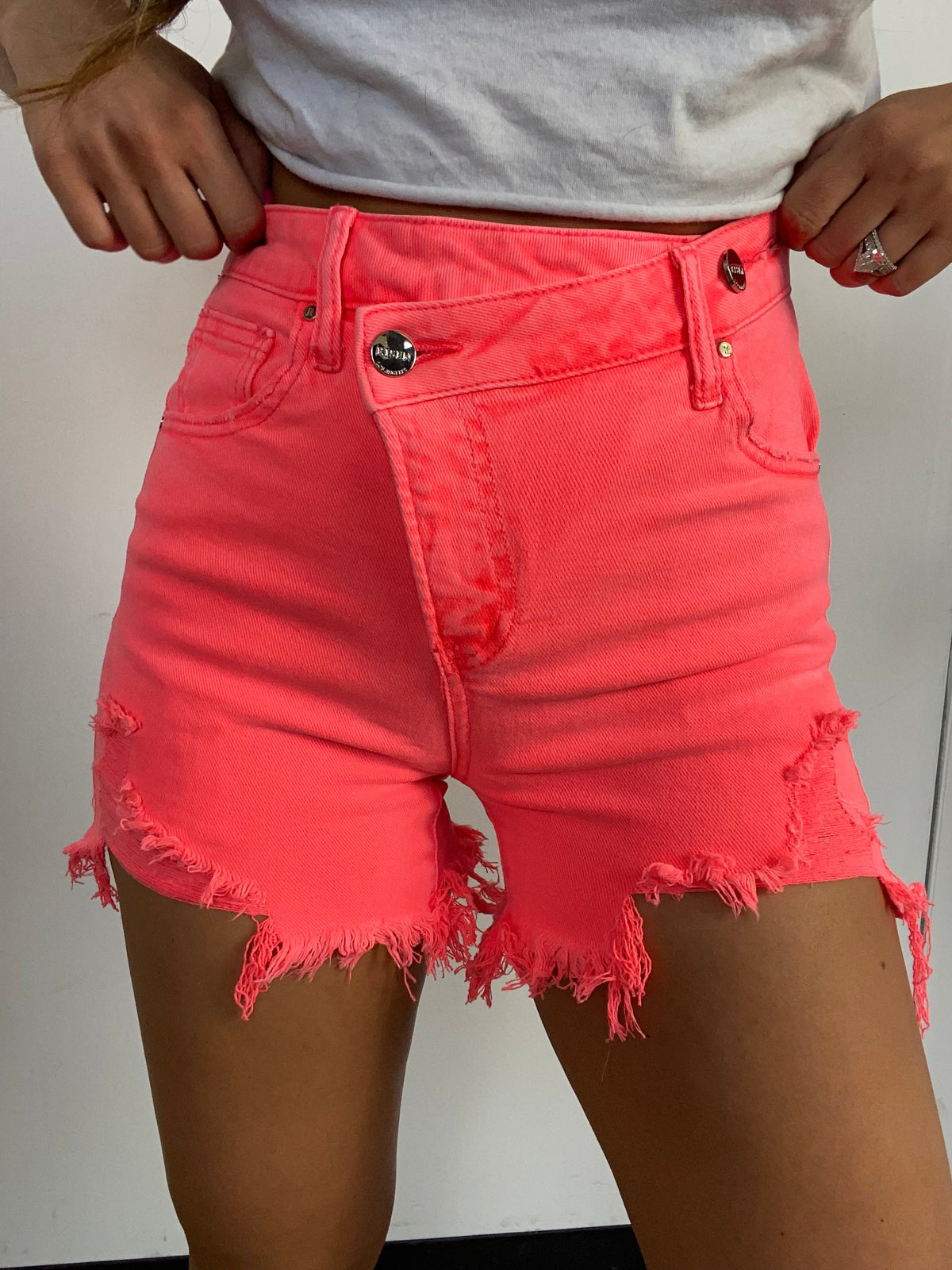 Lindsey Asymmetrical Distressed Shorts- Coral Pink