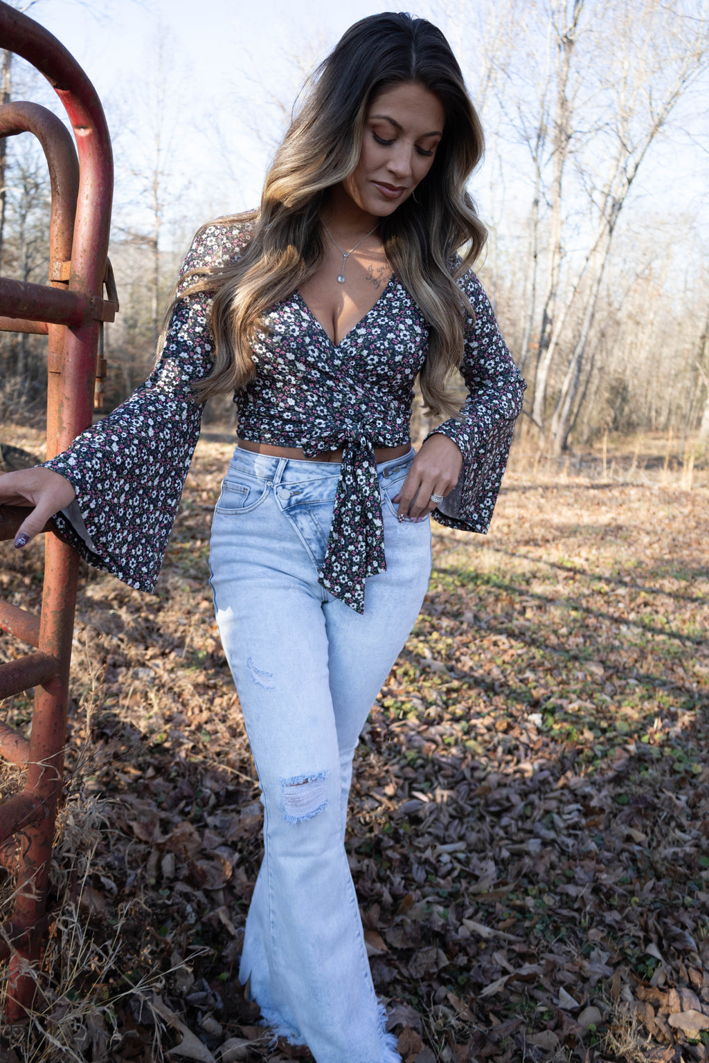 Lucy Asymmetrical Distressed Flare Jeans