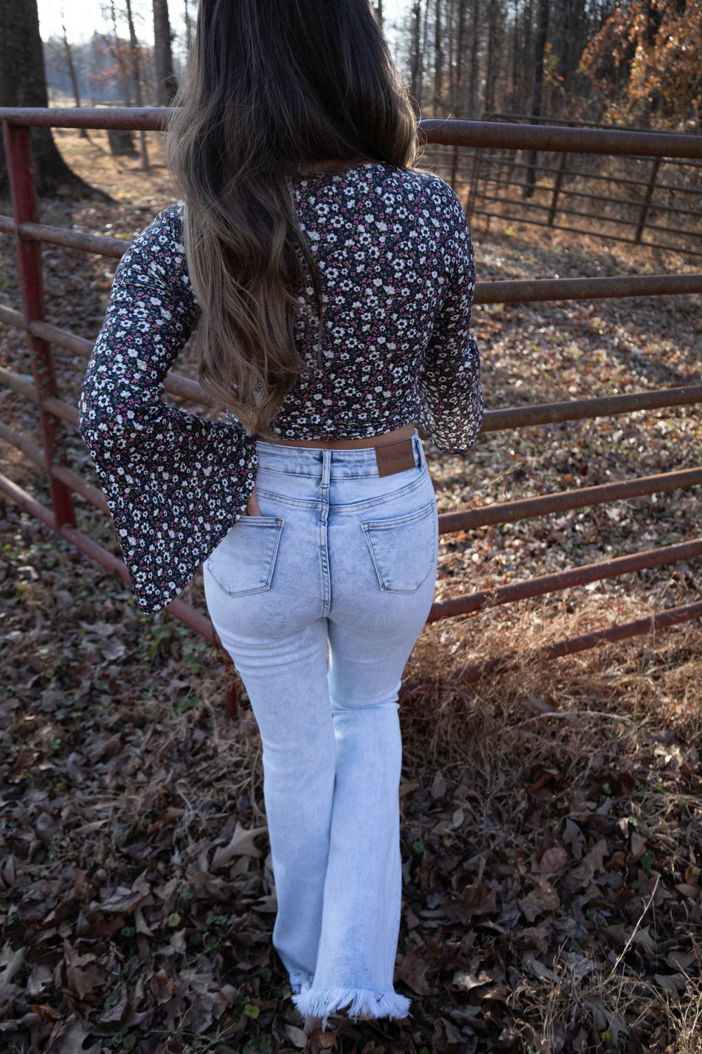 Lucy Asymmetrical Distressed Flare Jeans