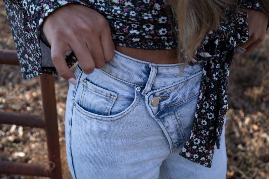 Lucy Asymmetrical Distressed Flare Jeans
