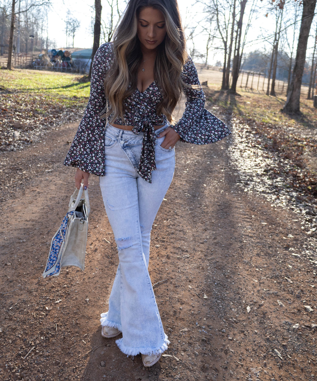 Lucy Asymmetrical Distressed Flare Jeans