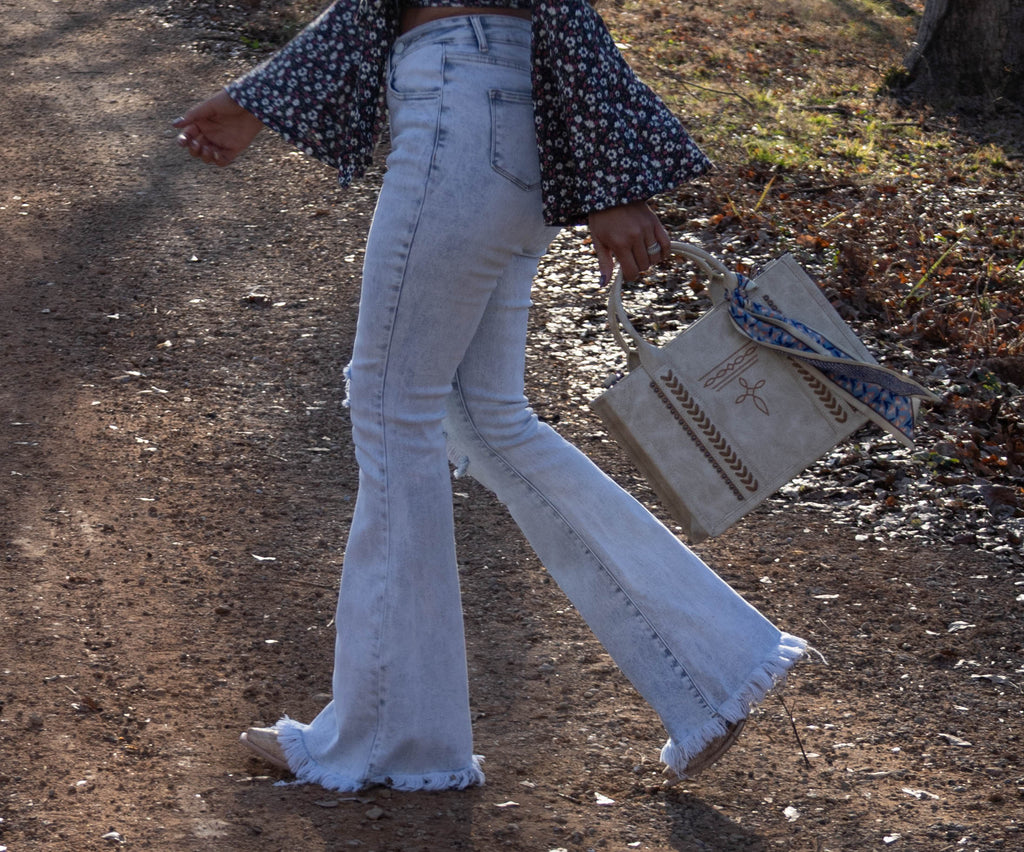Lucy Asymmetrical Distressed Flare Jeans