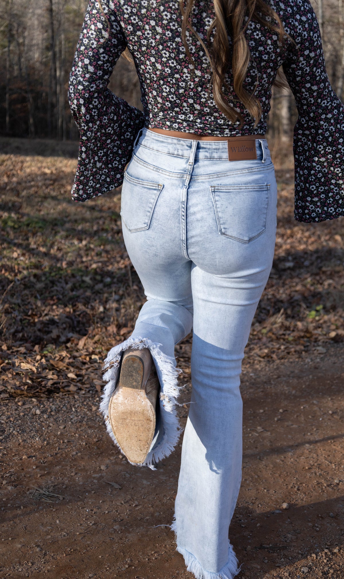 Lucy Asymmetrical Distressed Flare Jeans