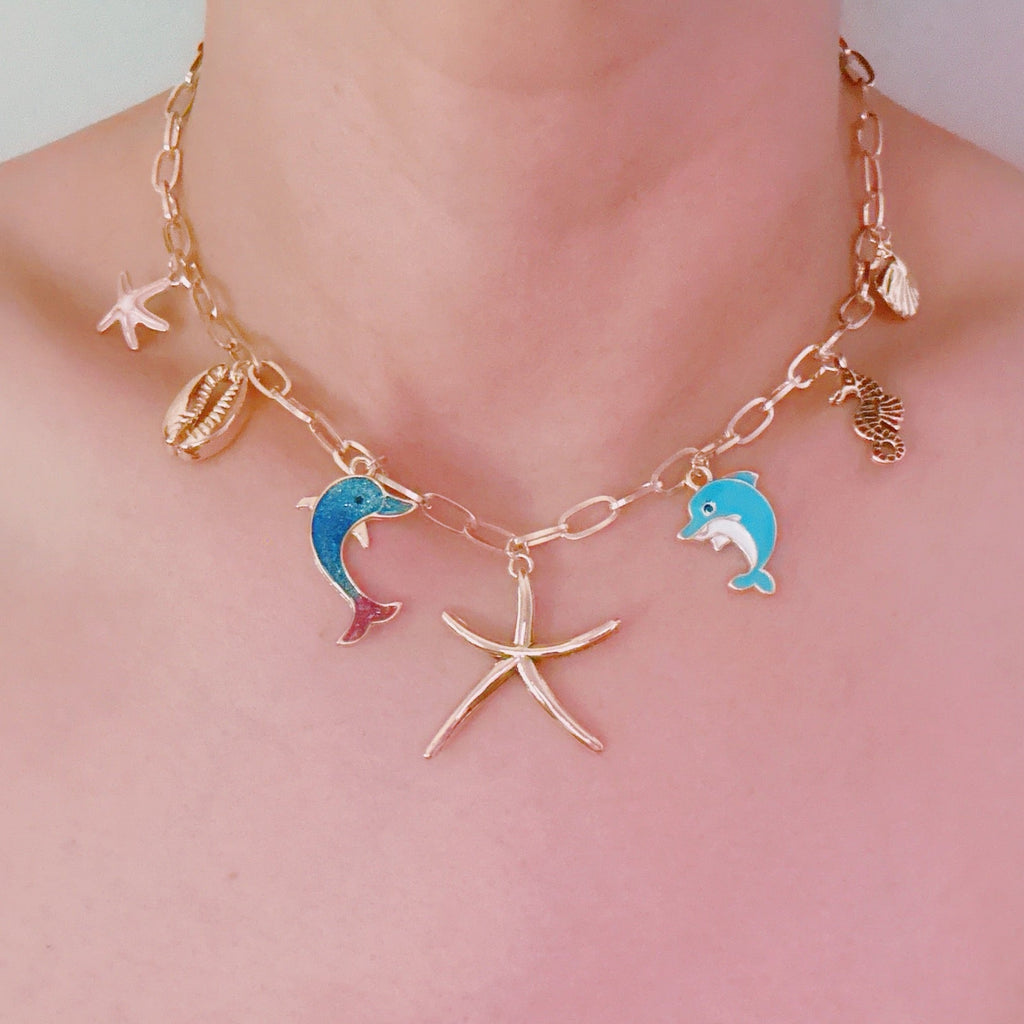 Ocean Play Charm Necklace – Dolphin, Starfish & Shell