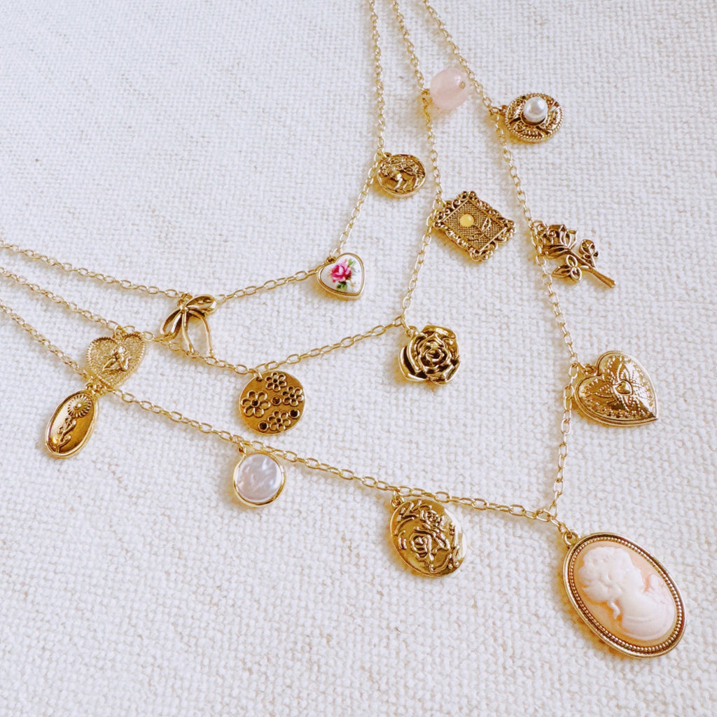 Vintage Rose Charm Layered Necklace – Romantic Multi-Strand Chain with Antique-Inspired Cameo Details